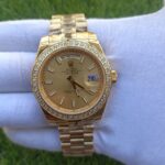 rolex-day-date-40-presidential-champagne-dial-diamond-bezel-president-bracelet-yellow-353_720x.jpg