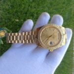 rolex-day-date-40-presidential-champagne-dial-diamond-bezel-president-bracelet-yellow-353_720x.jpg