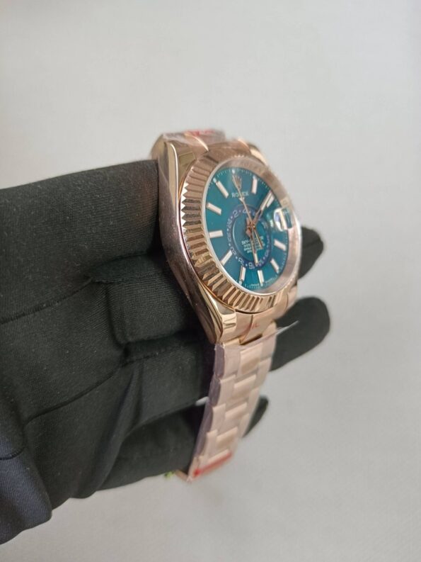 New-Rolex-Sky-Dweller-Rose-Gold-Blue-Index-Dial-Fluted-Bezel-Oyster-Bracelet-336935-4-scaled-1-900×1200-1.jpg