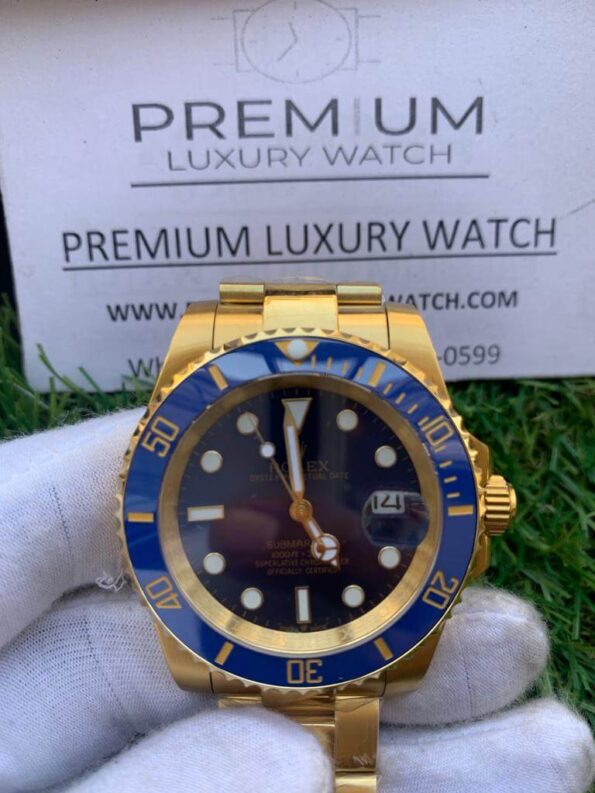 Rolex-Submariner-Date-Yellow-Gold-Blue-40mm-Dial-Ceramic-Bezel-Oyster-Bracelet-116618LB-9.jpeg