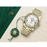 rolex-day-date-40mm-yellow-gold-white-roman-dial-fluted-bezel-president-bracelet-228238-833-1.png