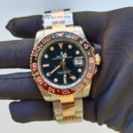 rolex-gmt-master-ii-root-beer-rose-goldsteel-black-40mm-dial-blackbrown-ceramic-bezel-126711chnr-replica-1i8ab.webp